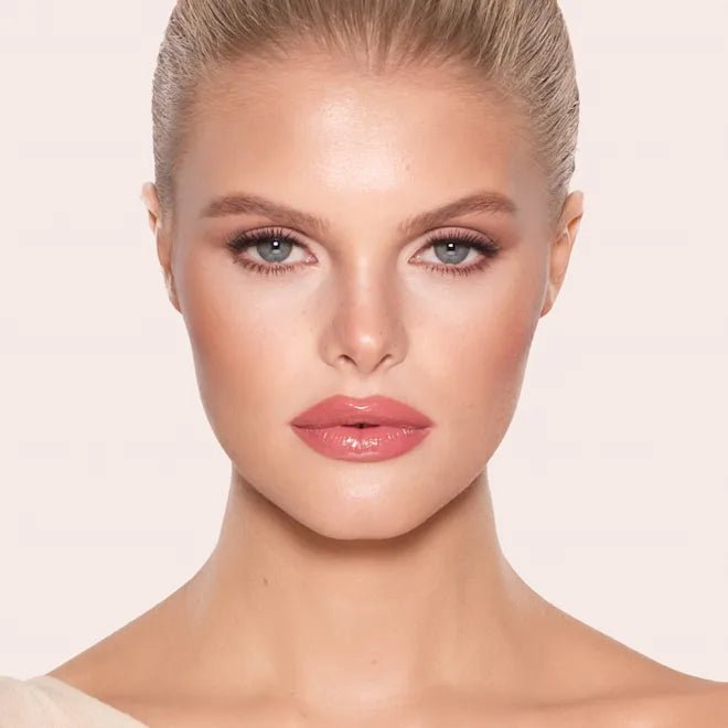 Charlotte Tilbury Nudegasm veido paletė - GlamoraBeauty